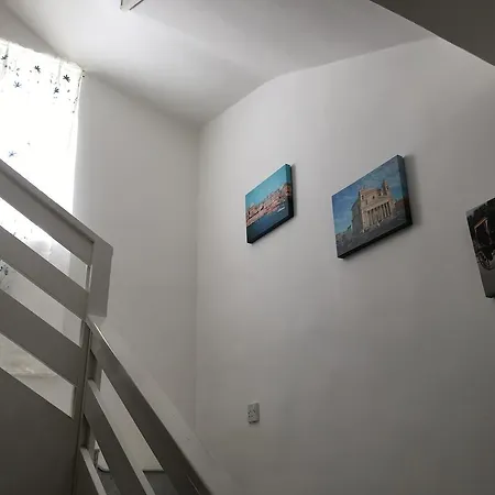 Arzella House *